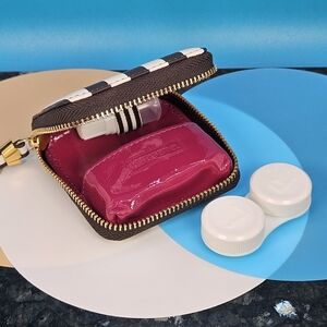 Henri Bendel travel case for contacts and jewelry with mirror, solution bottle